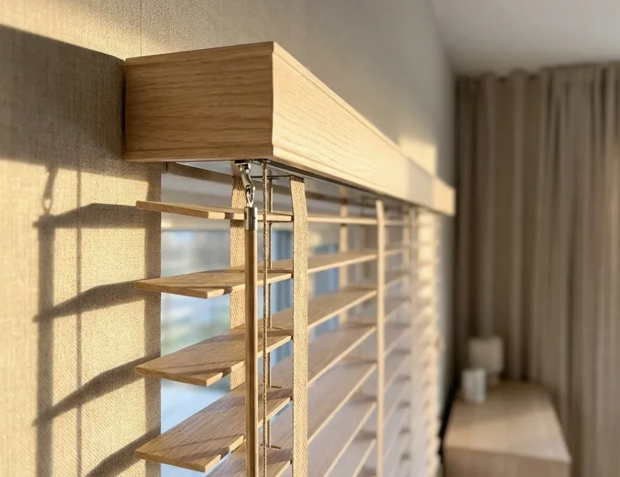 Timber venetian headrail with lift cords and fittings — the mechanism side of blind repairs in Waverley